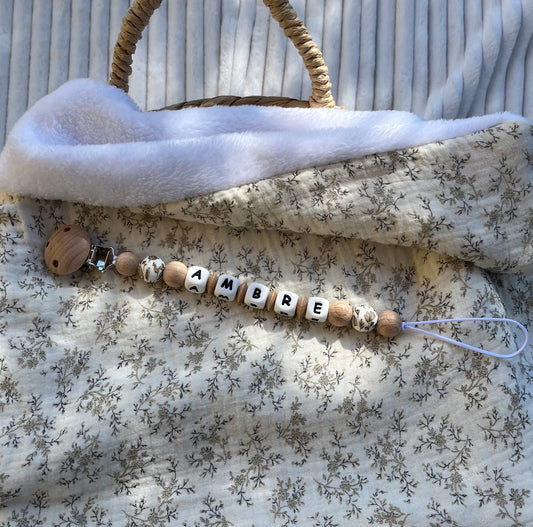 Attache tétine en bois et silicone fleuri