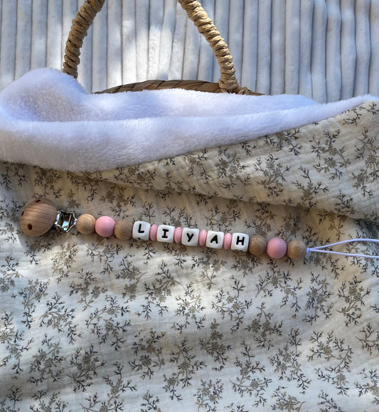 Attache tétine en bois et silicone rose pâle