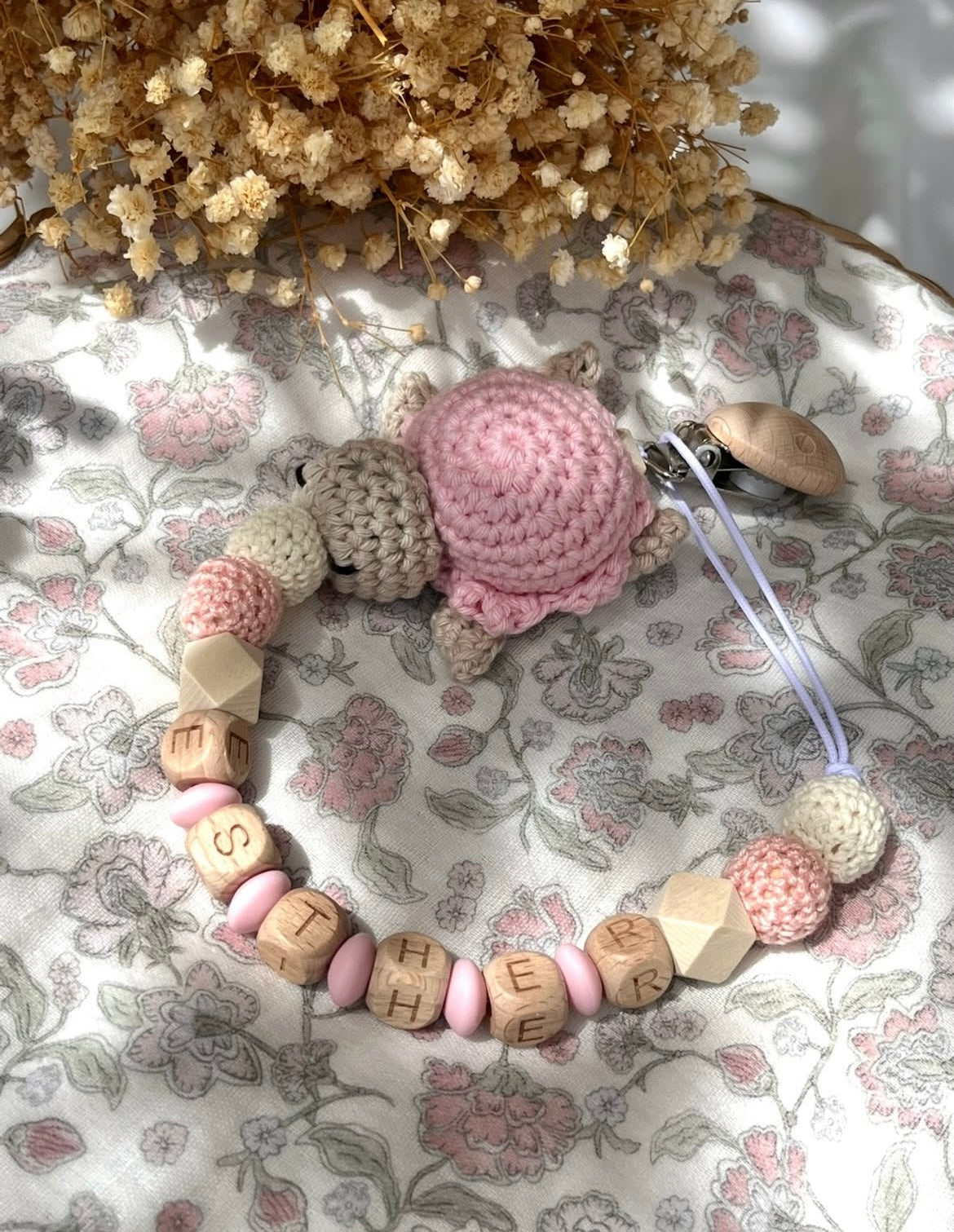 Attache tétine Tortue rose